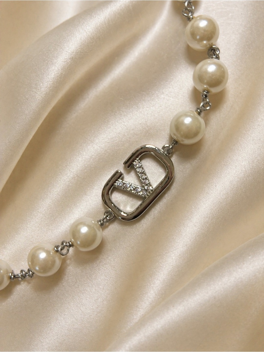 Silver and White Pearl Valentino V-Emblem Necklace - Picture 4 of 11
